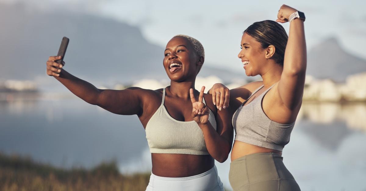 Black women posing together after a workout