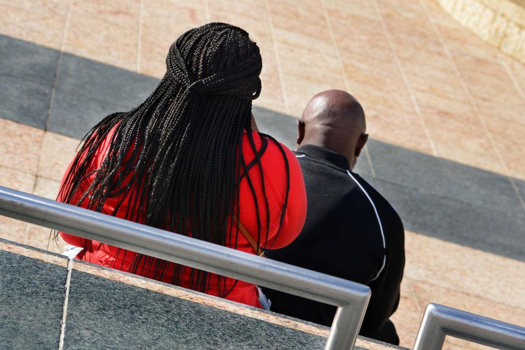 An African-American woman with braided hair