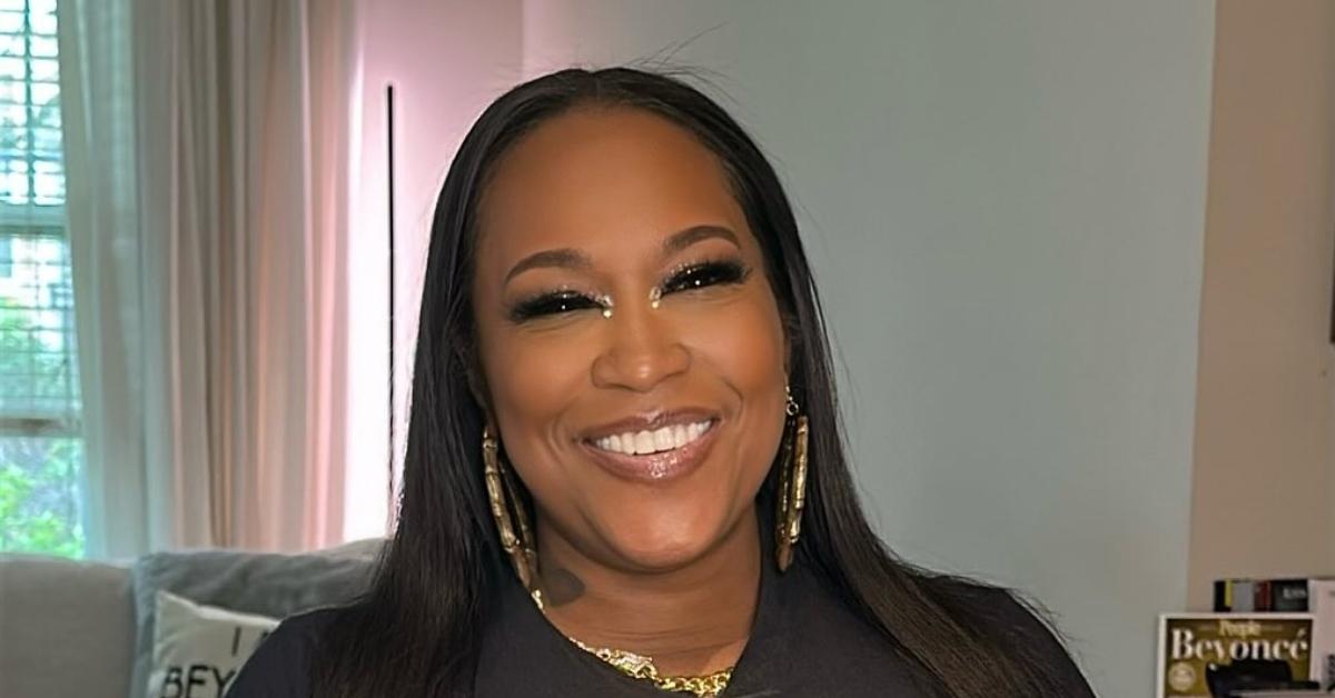 Maia Campbell wearing gold hoop earrings