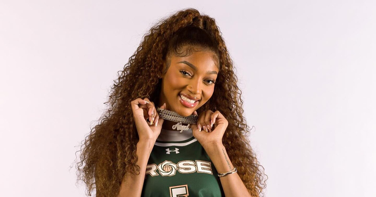 angel reese flexing chain in jersey