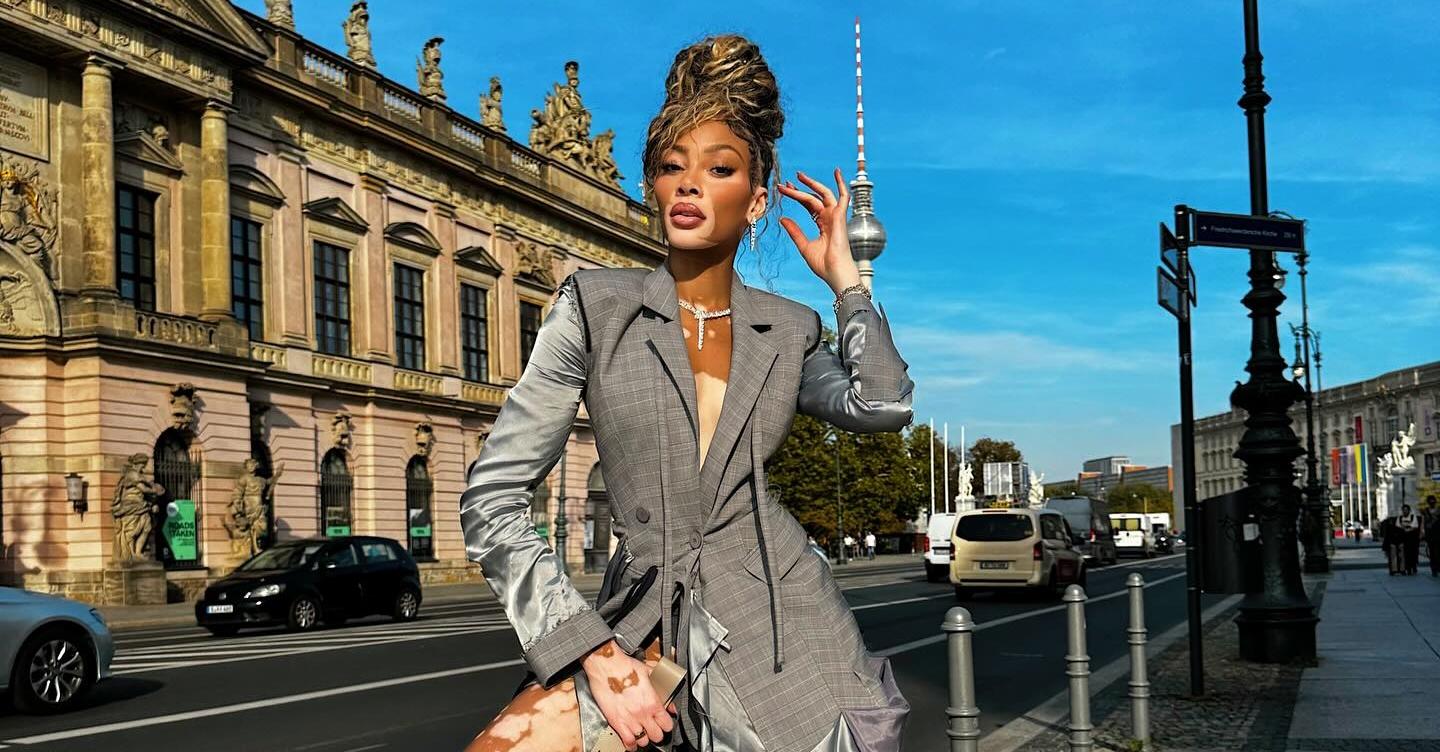 Winnie Harlow stops in Germany to speak on Vogue's Forces of Fashion panel.