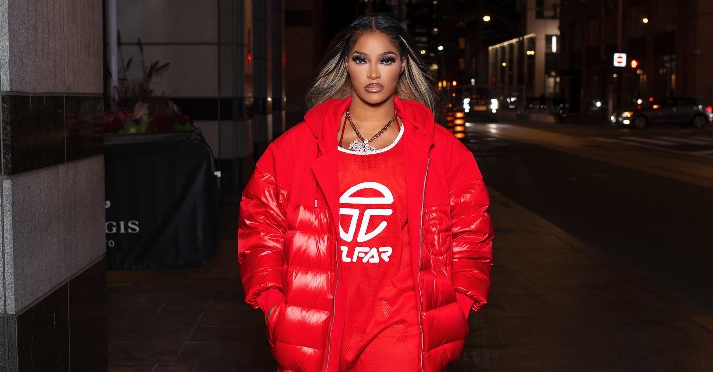 Joseline Hernandez wears Telfar jersey and puffer jacket.